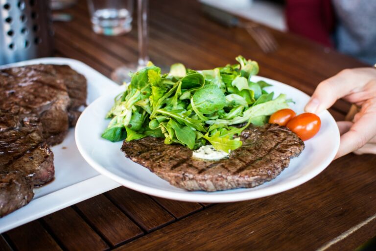 Grilled beef steak with side salad